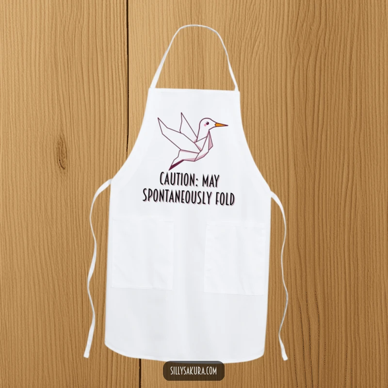 Funny apron with a giggling origami crane character soaring, perfect for adding a touch of airborne humor to kitchen activities.