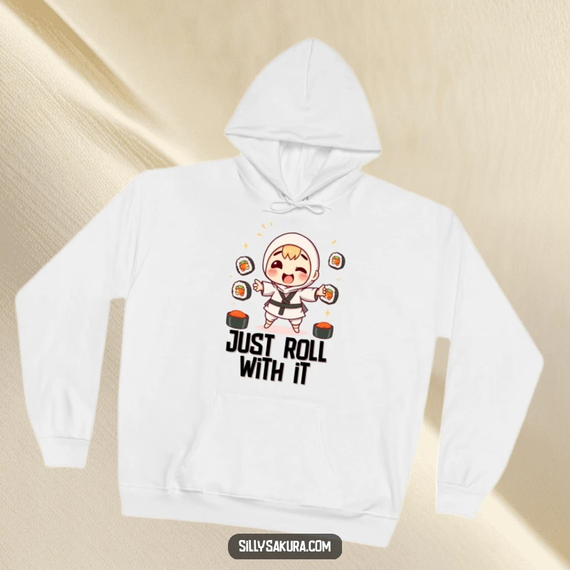 Funny hoodie depicting a character struggling to juggle sushi rolls, with soy sauce splashes, ideal for cold weather fun.