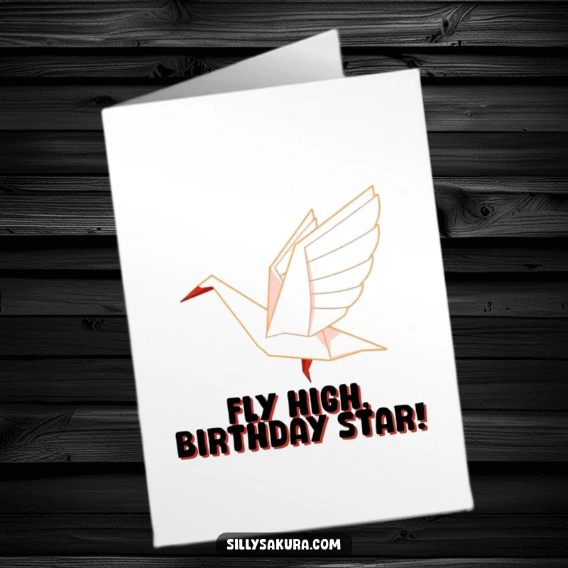 Funny Free Printable origami crane character gracefully taking flight, symbolizing birthday wishes and new journeys.