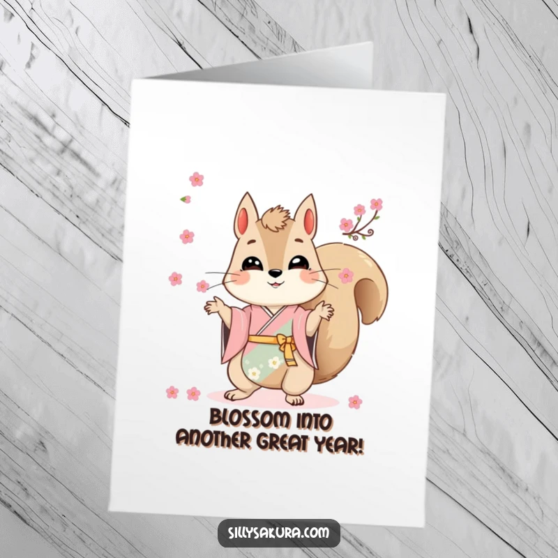 Funny Free Printable Birthday Card: A squirrel in a kimono gracefully juggles cherry blossoms.