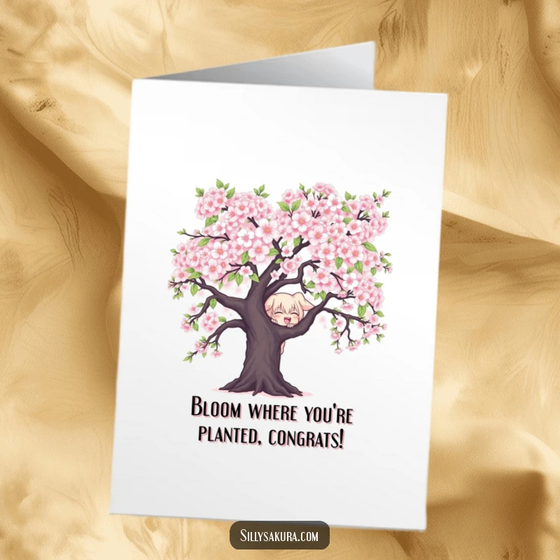 Free printable congratulations card featuring a mischievous character peeking from behind a beautiful blooming cherry blossom tree.