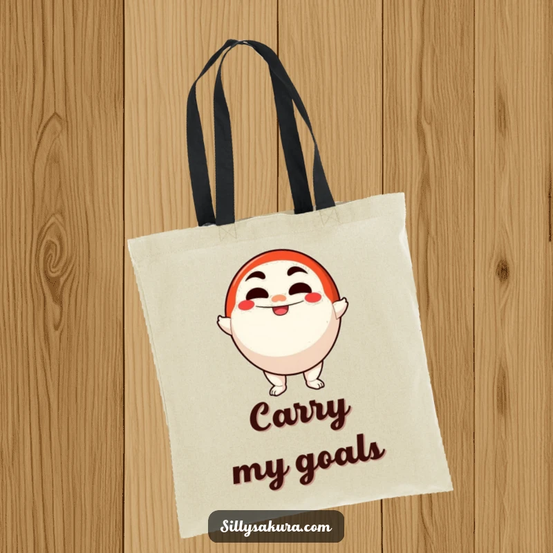Funny tote bag showcasing a happy Daruma doll character wobbling upright with a determined smile, ready for any task.