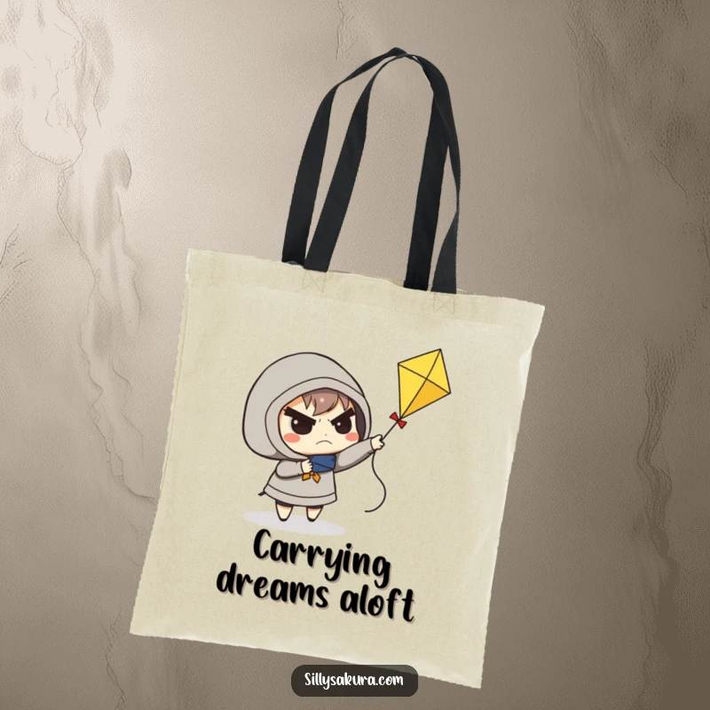 Funny tote bag showing a determined character frowning while struggling to fly a small kite, practical and humorous.